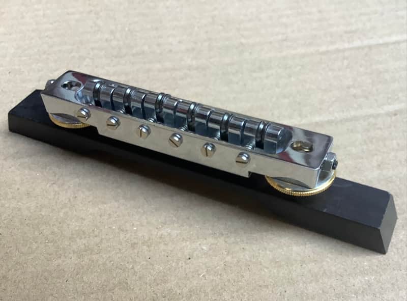 Unknown Vintage roller bridge with side screws and wooden base for guitar / archtop ? image 1