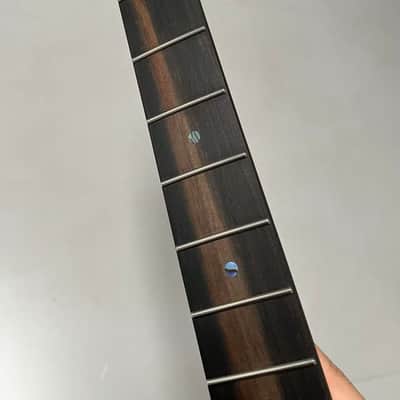 2.9mm frets Striped Ebony Fretboard 22frets 5a Roasted flame Maple guitar neck Radius 12inch Round stainless steel 22 frets Roasted flame Maple guitar neck Striped Ebony fingerboard 25.5inch hole 10mm Radius: 12 inches. image 6