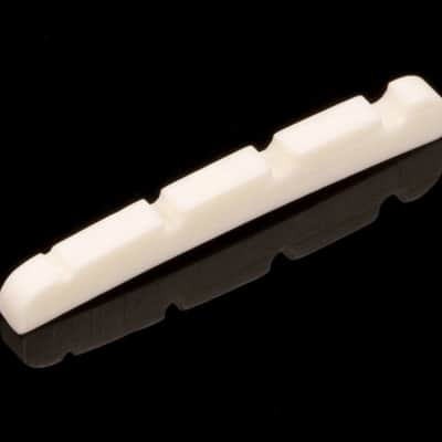 Genuine Fender® American Deluxe P-Bass Slotted Nut 007-8980-000 image 1