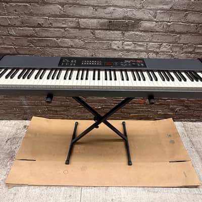 Roland RD-150 88-Key Digital Stage Piano w/ Roland Sustain Pedal & Samson Headphones | Made in Italy