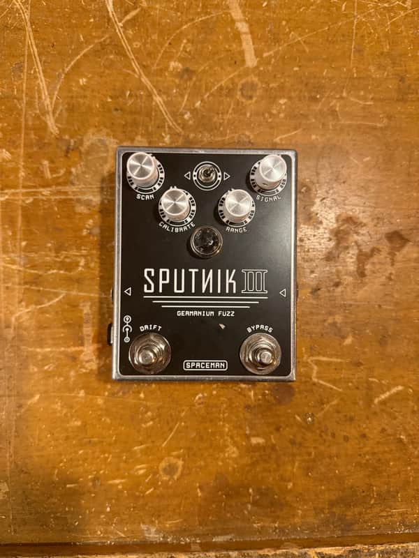 Blue and black fuzz pedal with knobs and "SPUTNIK III" text.