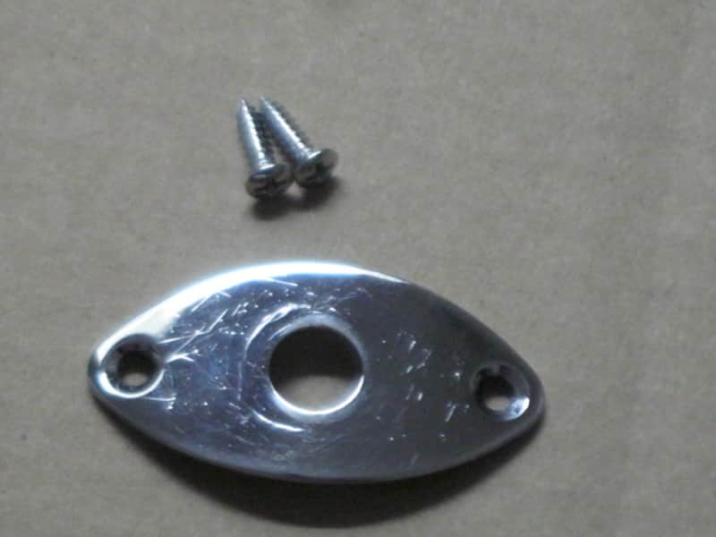 used (lightly relic'd) Gotoh JCB-2 Oval-shaped 2 screws Chrome metal  jack plate - also called JCB-2 Football Shaped 2 screw Chrom jack plate) Chrome plated brass (screws included) from 2010s image 1