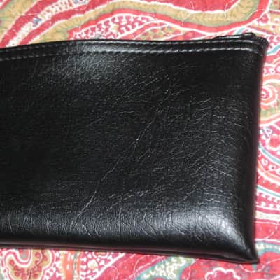 lightly used very clean 1980s Shure microphone pouch, outer areas are black vinyl with a very light reptile texture/appearance & one area has a red & silver graphic / inside is black / black zipper (NO microphone) 10 inches W, 4 & 1/2 inches H image 23