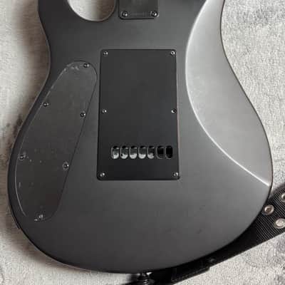 Sterling by Music Man John Petrucci Signature 7-String Stealth Black image 10