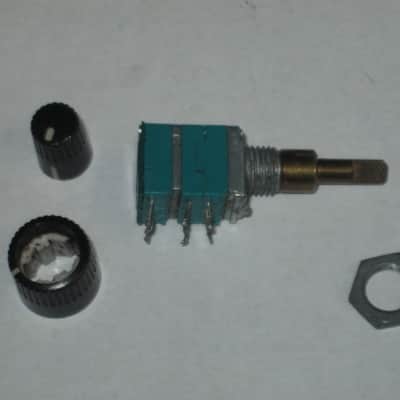 used (is fine & works) Boss MIDDLE / MID FREQ potentiometer [ upper part : 50 30C 04 5F / lower part: 10 4w 04 5F ] + nut and two piece knob (controls) taken off of MT-2 Metal Zone (pedal NOT included) 2000s / 2010 (teal rectangle shape, stacked) image 1