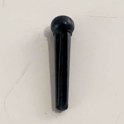 One Solid Black Guitar Bridge Pin For Acoustic Guitar Unknown Brand Vintage MIJ? image 2