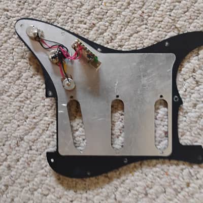 Nicely aged late1970s style Fender Stratocaster pickguard, partially loaded, Luthier parts for restoration project image 2