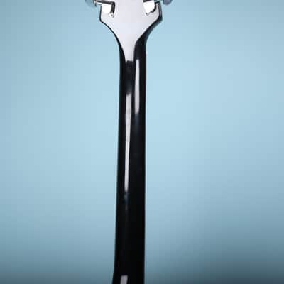 Flying V Style Electric Guitar in Black with White Pickguard image 10