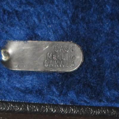 used genuine Gibson Dreadnought Hardshell Case from 2000s - Black Tolex Exterior, Wood Construction, Blue Plush Padded Interior, Gold Colored Hardware, lid has Gibson Acoustic Logo, fits square / round shoulder & cutaway dreadnought (NO guitar included) image 5