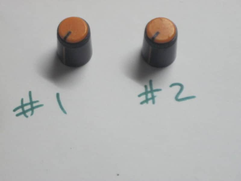 two used genuine Boss DF-2 KNOB, fits split shaft shaft (stem) mid 1980s/early 1990s - TOP: orange with black marker // SIDES: black // hard plastic (NO: pedal/other items) TOP side: some short scratches & few nicks / BLACK areas: few scratches image 1