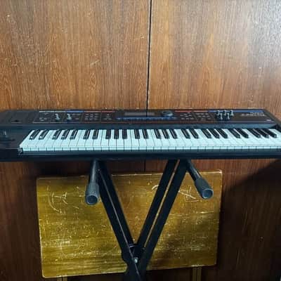 Roland Juno-Di Portable 61-key Mobile Synthesizer w/ bag power supply image 5