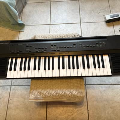 Vintage 80’s Yamaha PSR-50 Portatone Keyboard 49 Keys MIDI W/ Power Supply