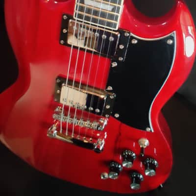 Southwest Acoustics Unveils the Iconic Double Cut: Classy and understated Cerise Red with a Heart for Pure Play image 3
