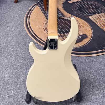 Peavey Milestone 4-String Electric Bass with Hardshell Case - Ivory image 4
