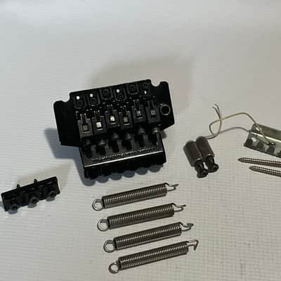 1990's Jackson Dinky Guitars JT-580LP Takeuchi Black Licensed Floyd Rose Tremolo Guitar Bridge image 1