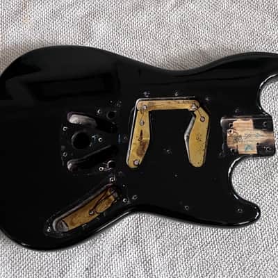 1970s Fender Mustang guitar body original black image 1