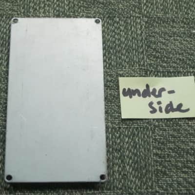 used medium relic'd genuine Boss Bottom Plate (Silver Label Taiwan) for compact (regular) size pedal, from March 1991 - PLATE PART: Metal w/ Silver Finish / BOTTOM LABEL: SLT / EXTERIOR PADDING: Black stiff hardened rubber - NO: pedal/screws/other items image 21