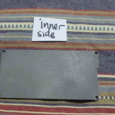 used Boss bottom plate (NO: rubber padding,label,serial number) for compact sized pedal - specifically from mid 1980s - metal, OUTER side: semi-gloss gray fiish / INNER side: flat gray finish -- back end has factory made small cut out for power jack image 18