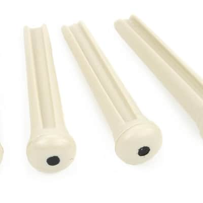 Graph Tech PP-1122-00 TUSQ Traditional Style Bridge Pin Set - White with 2mm Black Dot (set of 6) Bundle with Ernie Ball P03221 image 1
