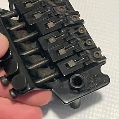 1990's Jackson King V & Dinky Guitars JT-580 Takeuchi Black Licensed Floyd Rose Tremolo Guitar Bridge image 14