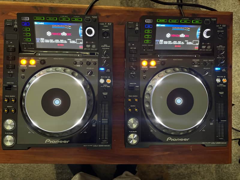 Two (2) Pioneer CDJ-2000 NXS w/ DeckSavers + Flight Cases image 1