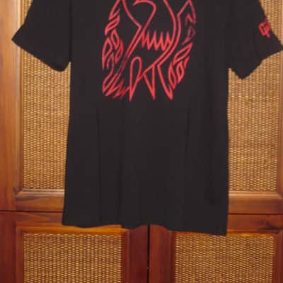 lightly worn genuine Gibson Firebird T-Shirt XL (X-Large), Black with Red Graphic, 60% Cotton / 40% Polyester - short sleeve GIBS-GA-FBBMXL (GA-FBBMXL) UPC # 711106533919, part of back neck area & right shoulder were re-stitched image 1