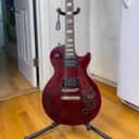 1990 Gibson Les Paul Studio Electric Guitar – Wine Red – Trapezoid Inlays. Motivated seller—dropping the price for a quick sale and now open to reasonable offers!