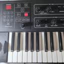 Sequential Prophet 600 61-Key 6-Voice Polyphonic Synthesizer 1982 - 1985 - Black with Wood Sides