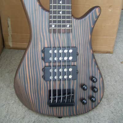 5 string bass guitar,  Zebra wood body. Active pickups. image 2