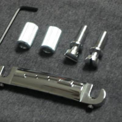 lite use (generally very clean) Gibson (sourced from Ping Works - PW) Lightning Bar Compensated Wraparound Bridge, Chrome [+ studs & anchors & hex key tool] from mid 2010s Gibson LP Jr floor piece (guitar NOT included) Chrome Plated ZINC image 2