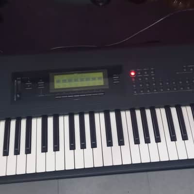 Korg T3 EX MUSIC WORKSTATION KEYBOARD 1989-1990 is without EX SAMPLE BOARD