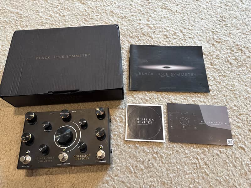 Collision Devices Black Hole Symmetry