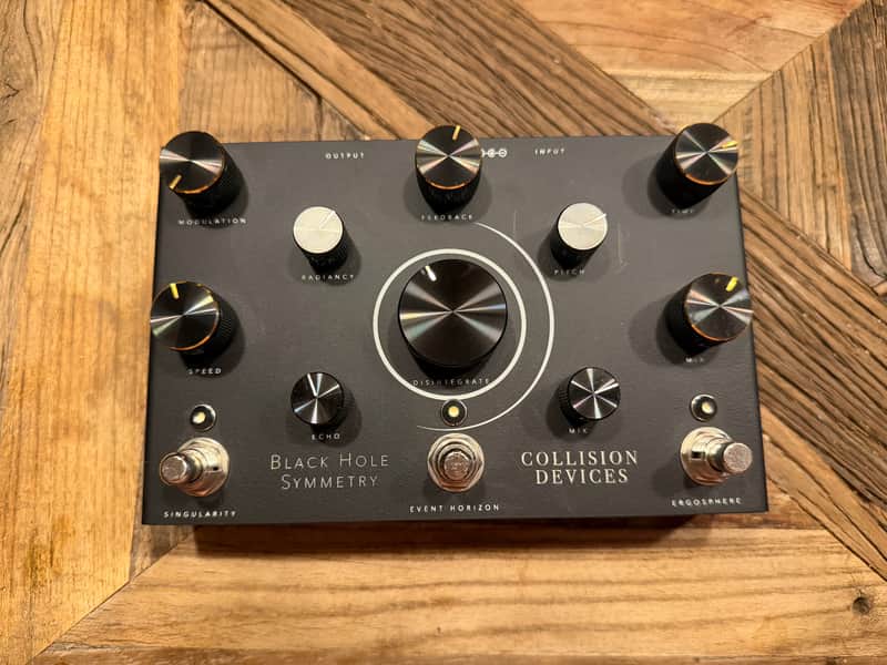 Collision Devices Black Hole Symmetry