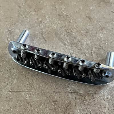 1960s Fender Jazzmaster Jaguar guitar bridge threaded saddles image 1