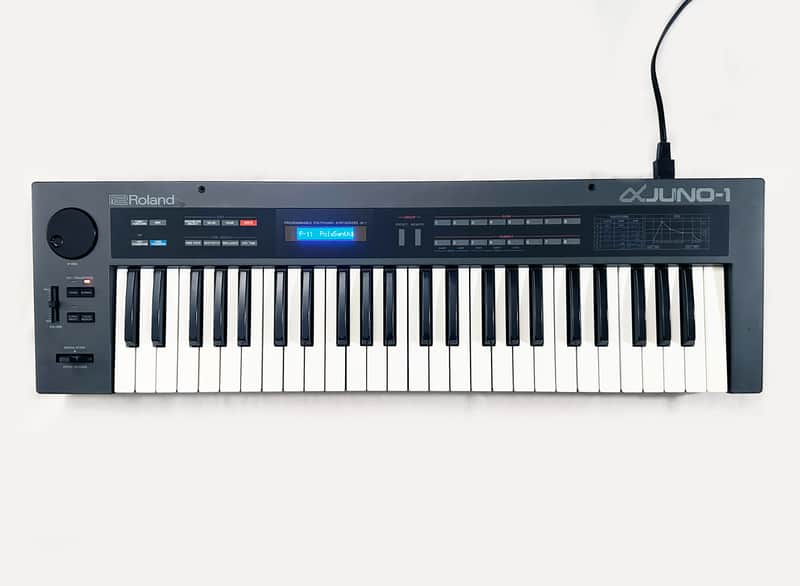 ROLAND Alpha JUNO-1 Vintage Analog 49-Key Synthesizer Made in JAPAN- 1985. SERVICED with New LCD !  Works Perfect !...