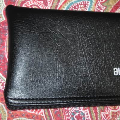 lightly used very clean 1980s Shure microphone pouch, outer areas are black vinyl with a very light reptile texture/appearance & one area has a red & silver graphic / inside is black / black zipper (NO microphone) 10 inches W, 4 & 1/2 inches H image 15
