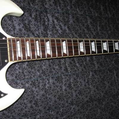White MIJ Photogenic SG with Gibson deluxe tuners and open book