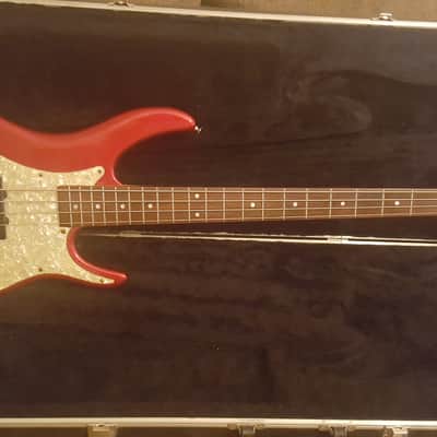 Peavey Axcelerator Series 2006 Metallic red, pearl pickguard. Comes with factory case. image 1