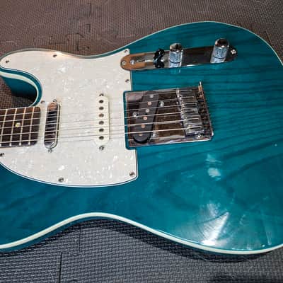 Fender American Deluxe Telecaster with Rosewood Fretboard 1999 - 2003 - Teal Green Transparent image 1