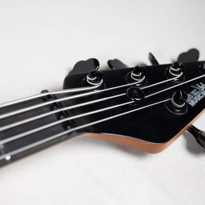 Israelite Stringed Instrument Ernie Ball/Music Man DarkRay 5 Bass Guitar | Stealth Black | | Reverb
