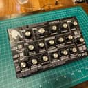 Moog Minitaur w Oversynth Panel