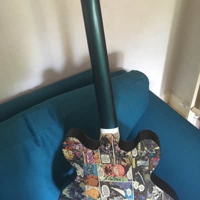 Old Antoria Guitar covered in 80's Sliver Surfer Comics, no pickups, worn frets. PROJECT image 9