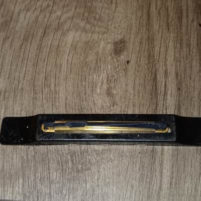 Guitar saddle Unusual Design - Plastic base. Metal insert image 9