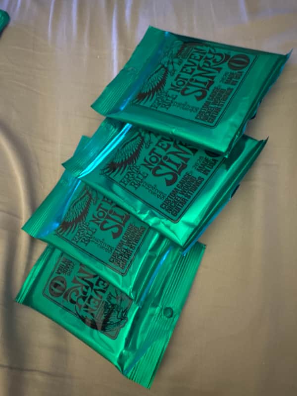 4 Sets of Ernie Ball 2626 Not Even Slinky Nickel Wound Drop Tuning Electric Guitar Strings (12 - 56) 2010s - Silver image 1