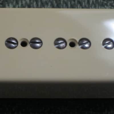 mostly very clean 1990s Gibson P-100 Soapbar pickup with Creme Cover (but can sell with black cover instead) NO mounting screws 6.3k - ideal for NECK position (2 conductor, solder connect) a P100 is a stacked humbucker that's hum-cancelling image 8