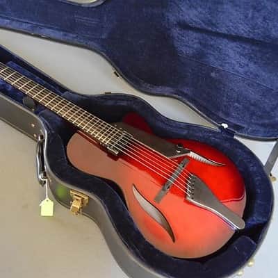 2017 Peerless 12" Serena carved spruce archtop, light travel/ parlor size guitar. Ruby Sunburst, image 1