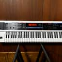 Roland Juno-Di Portable 61-key Mobile Synthesizer White color w/ gig bag