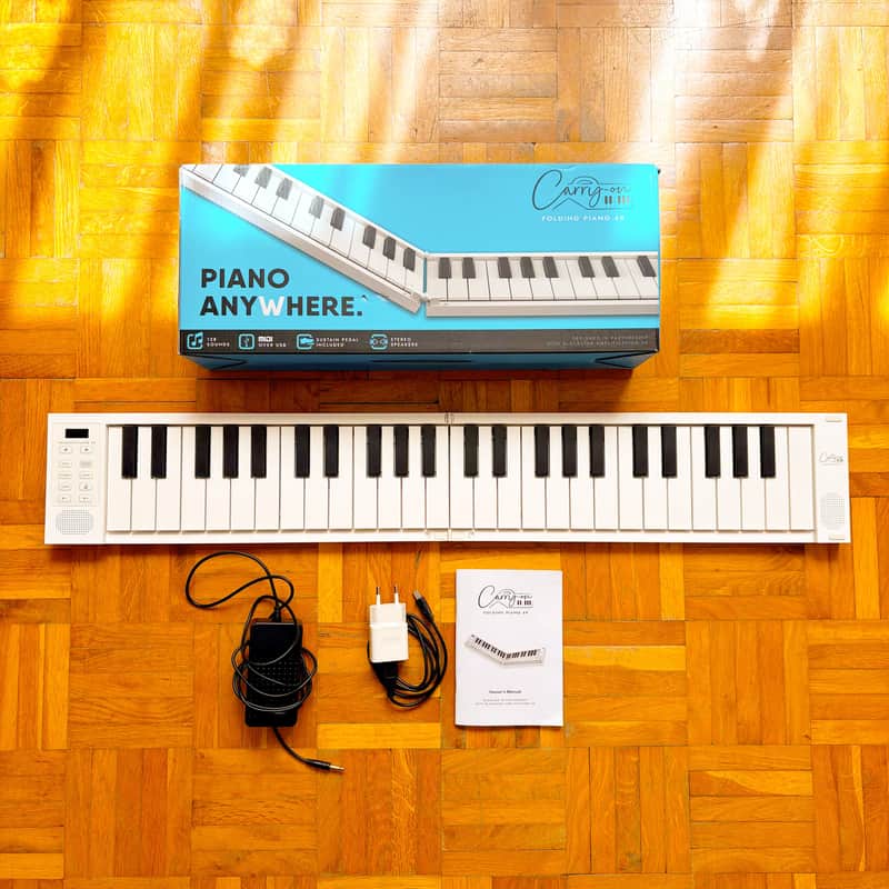 Blackstar Carry-On Folding Piano 49-Key Portable Digital Piano – Foldable, USB-MIDI, 128 built-in sounds! Mint condition with extra power supply! Bild 1