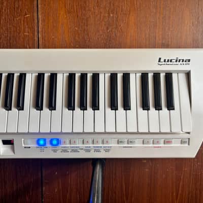 Roland Lucina AX-09 37-Key Keytar Synthesizer Pearl White w/ power supply image 3