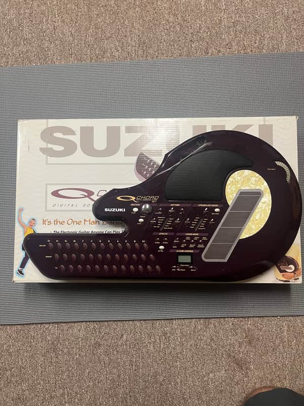 Suzuki QC-1 QChord 1999 - Red image 1